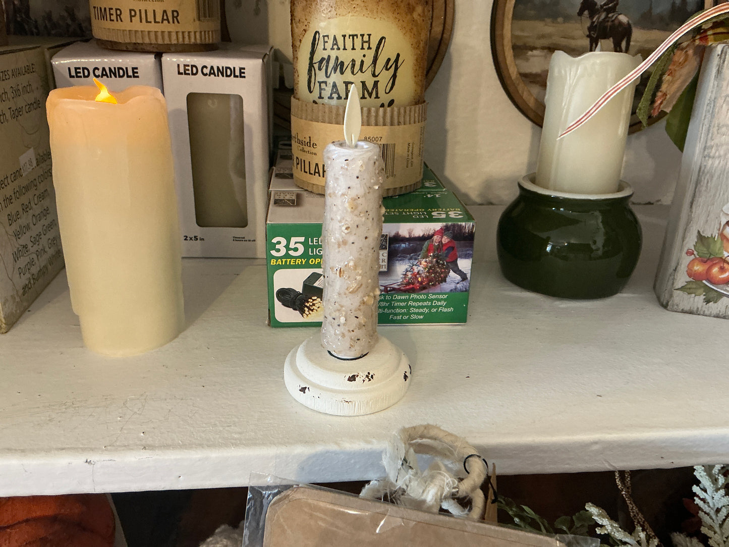 Silicone dipped candles on wood base