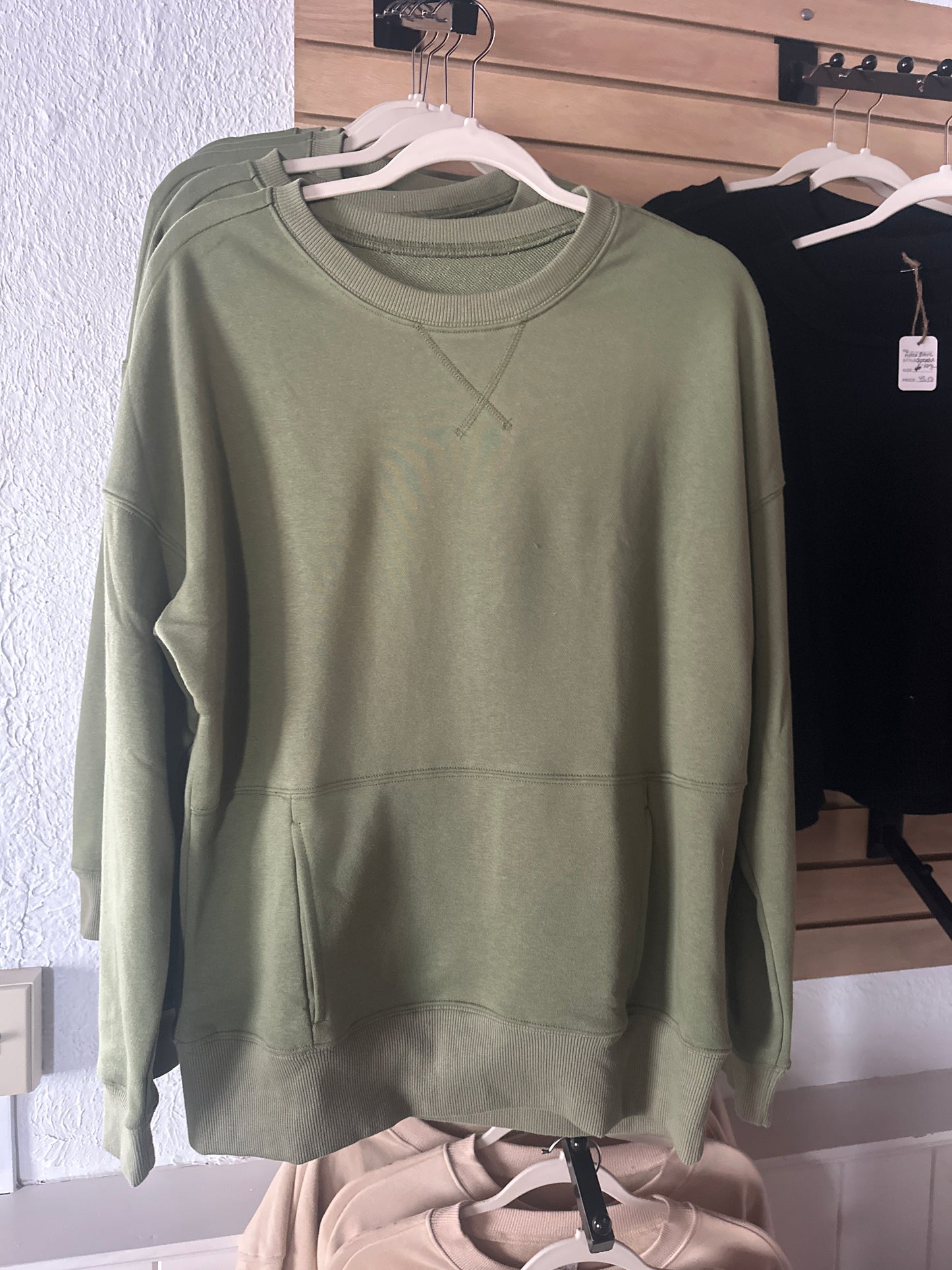 Green sweatshirt with pockets